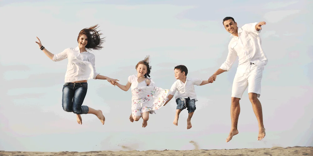 family jumping for Wimbledon Chiropractic & Sports Injury Clinic | Chiropractor Wimbledon